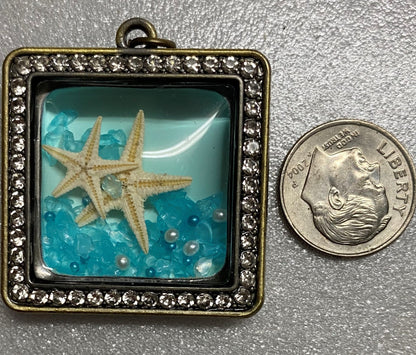 Sea Pendant with Movable Inside Pieces