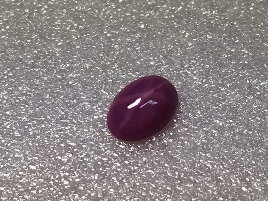 Lab Created Star Ruby 7x5mm Oval Cab 0.75ct