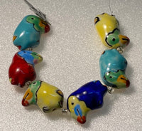 Multi Ceramic/Glass Toucan Bead Strand