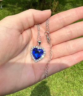 Blue Heart Shaped Pendant and Silvertone Necklace