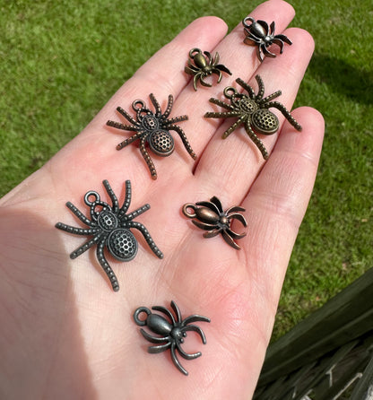 Set Of Seven Metal Spider Pendants/Charms