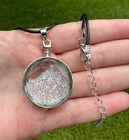 Glass Pendant with Movable Aurora Borealis Pieces