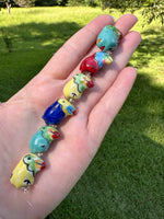 Multi Ceramic/Glass Toucan Bead Strand